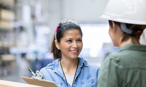 Hardware store employees smiling